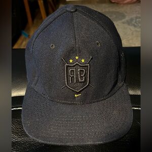 Navy Blue Baseball Cap with Embroidered Crest and Yellow Accents RB 2008